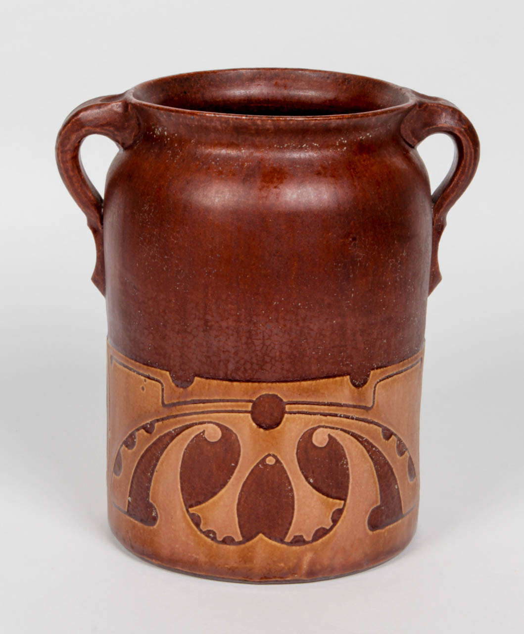WILLEM COENRAAD BROUWER  (1877-1933)  The Netherlands
POTTERIJ VREDELUST  Leiderdorp, The Netherlands

Vase with handles  circa 1905

Brown glazed red clay with tan light brown cut out overlaid and sgraffito decoration in a stylized organic