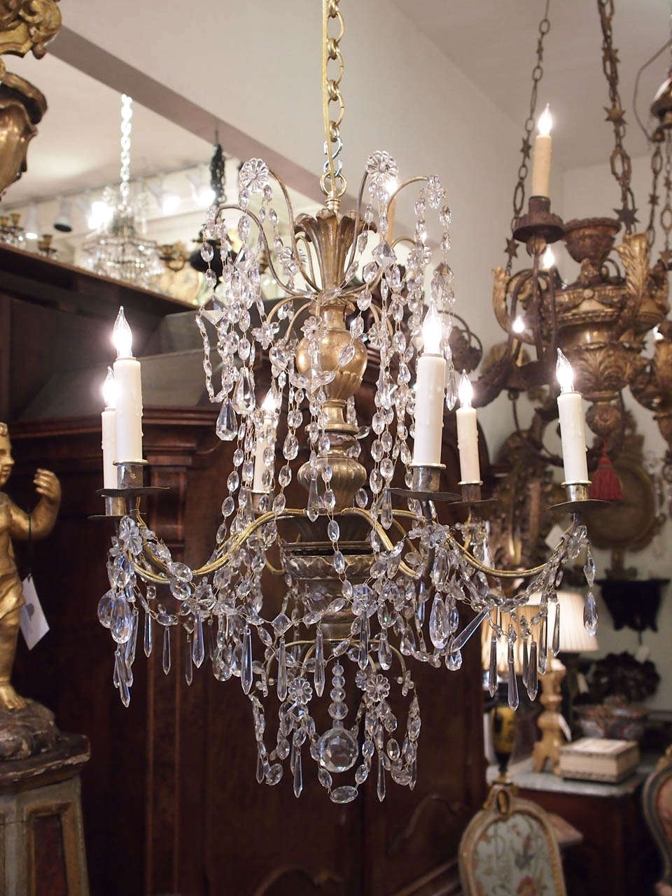 Small scale 18th century gilt wood and gilt iron with crystal dressing Genovese 
chandelier.