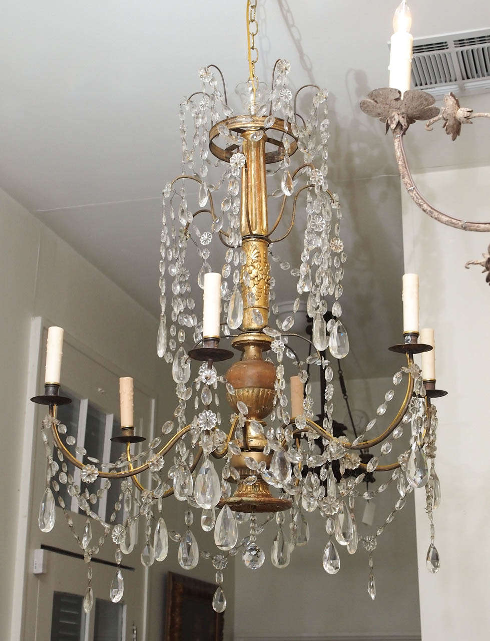 Italian Genovese Empire Chandelier with gilt wood stem and gilt iron arms with crystal dressing