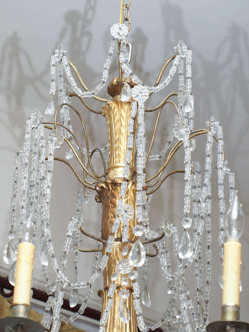 Italian Genovese Chandelier with Gilt Iron Arms And Wood Stem In Excellent Condition In Natchez, MS