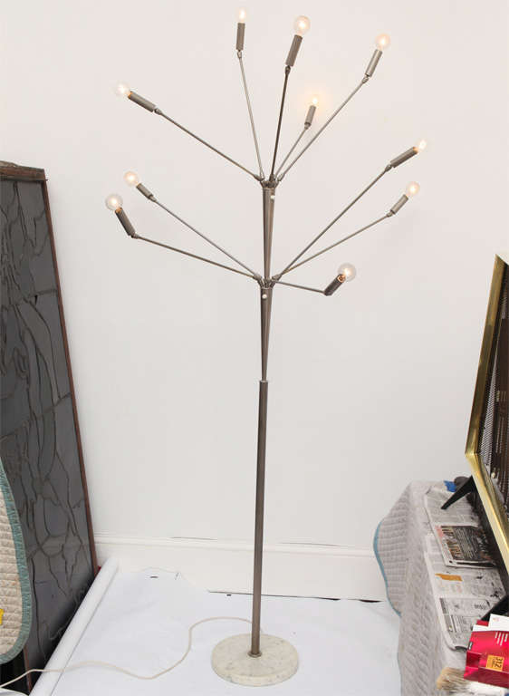 A 1960s, Italian Futurist articulated floor lamp with multiple adjustable arms