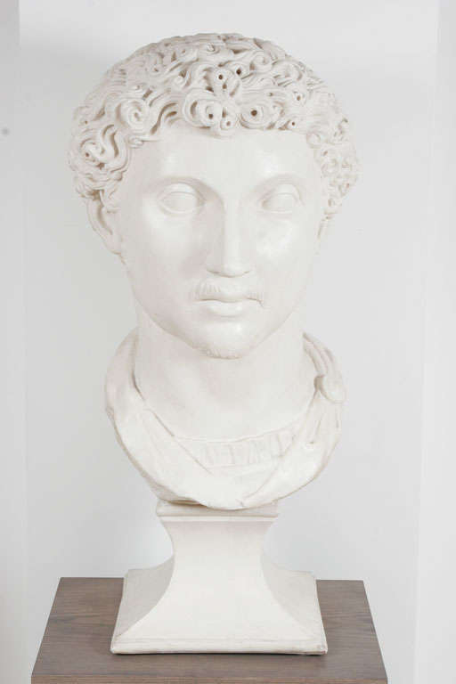 Bust of Man in Roman Style

Large reproduction vintage bust of a classic held in The British Museum probably a young Hadrian made from specialist reconstituted marble circa 1950