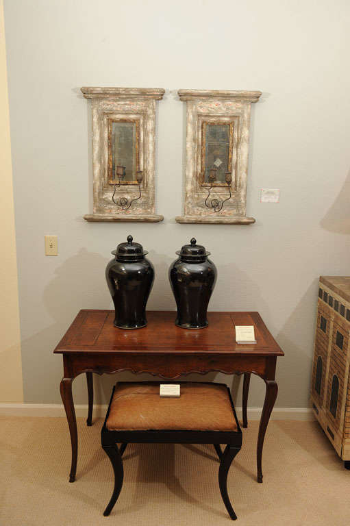 A pair of wall sconces
