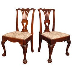 Antique Pair of George III carved mahogany side chairs.