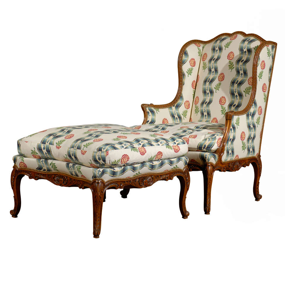 Antique French Wing Chair and Stool at 1stDibs