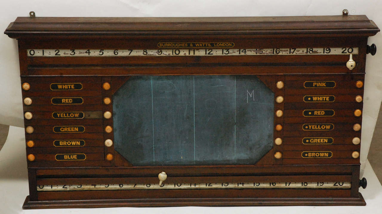 This is a very old antique marking board, circa 1890, made in England by Burroughes and Watts, London. The board has a great variety of marking elements and would benefit players and score keepers in any games room. Use it for "Pool, Billards,