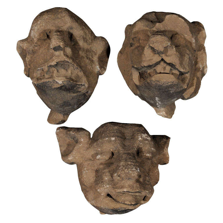 Rare 15th century carved stone gargoyle faces