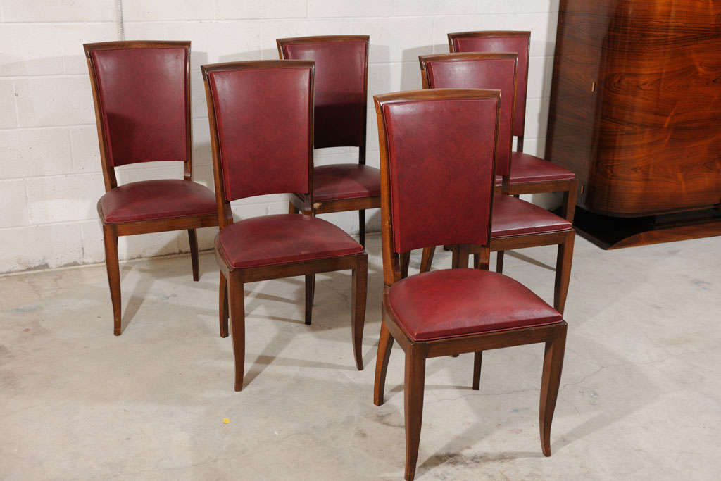 These Art Deco dining side chairs are in their original condition and are made in France.  Art Deco furniture has never really gone out of style and is making a huge comeback.  These chairs are perfect for a contemporary spin in a dining room.