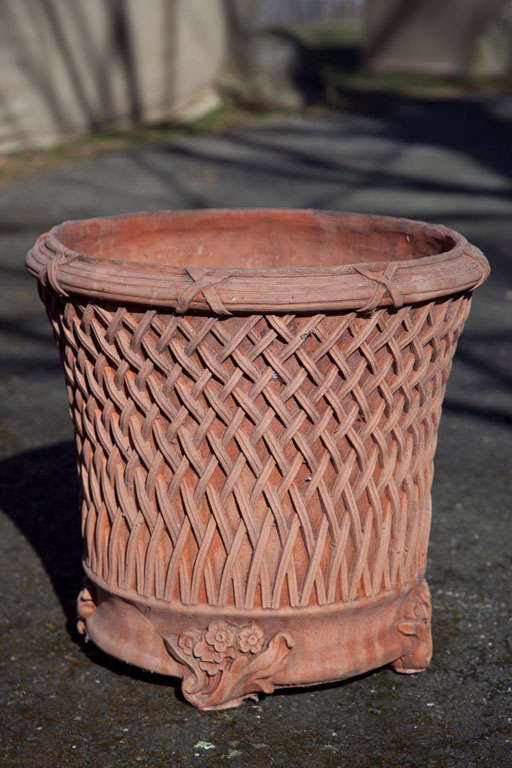 Round terra cotta planters with basket weave design
Priced individually