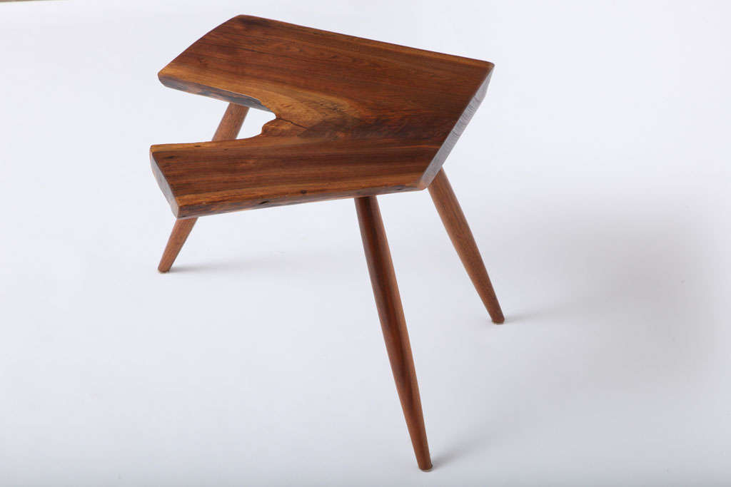 George Nakashima 3 legged side table<br />
Walnut