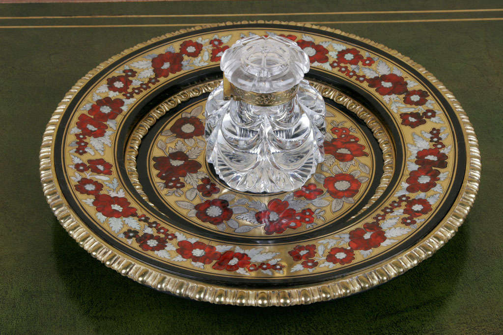 An exceptional early William IV circular standish in floral boulle marquetry with mother-of-pearl, pewter and tortoiseshell. Each band of marquetry is bordered with a finely chased lacquered brass border. At the centre is a fine quality Baccarat cut
