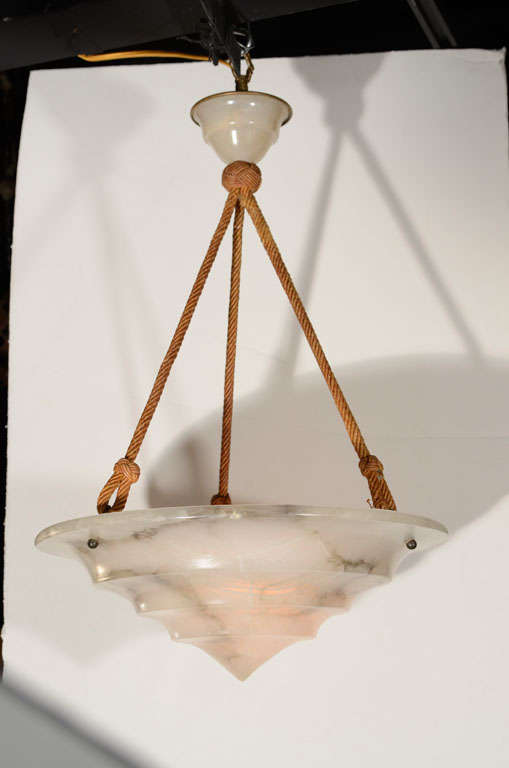Vintage carved alabaster pendant light fixture with custom handmade silk hanging cord. France, circa 1940.  

This custom silk hanging cord is available by special order from Metropolis Modern for other light fixtures; please contact us for