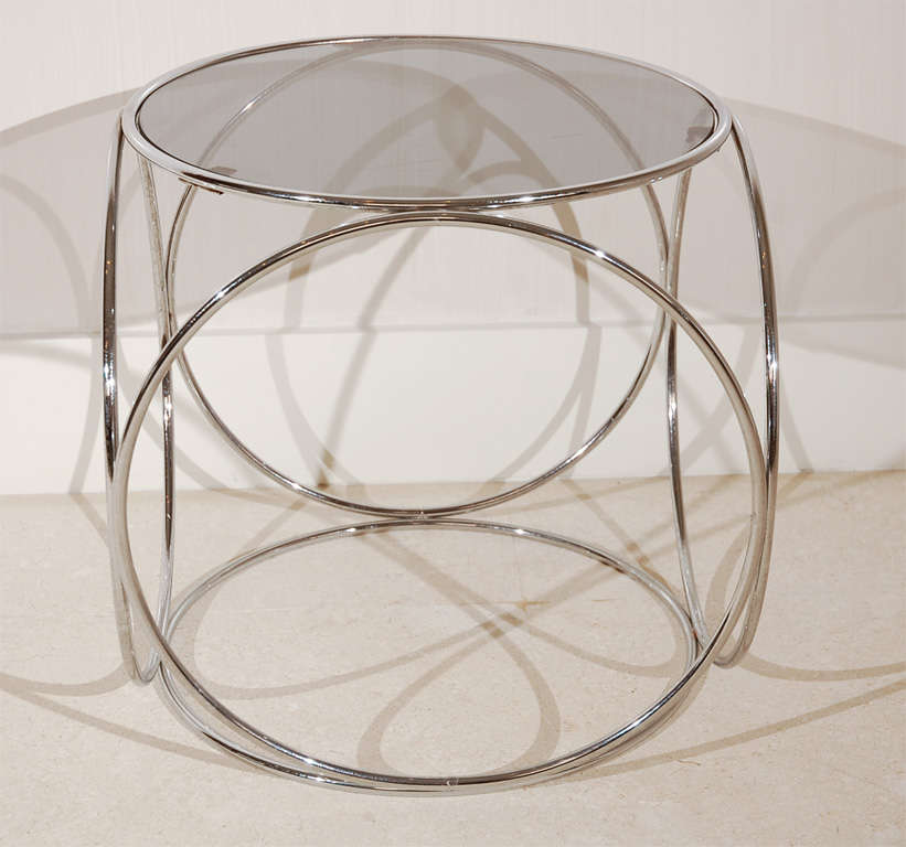 A Chrome and Smoked Glass Occasional Table