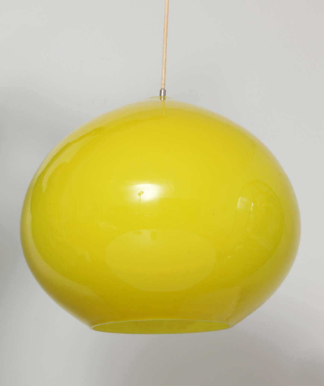 Spectacular Vistosi pendant in a rarely-seen size, complete with original canopy. Made of cased, blown glass in a crisp lemon yellow. 

Ceiling drop from canopy to bottom of shade is 43.5