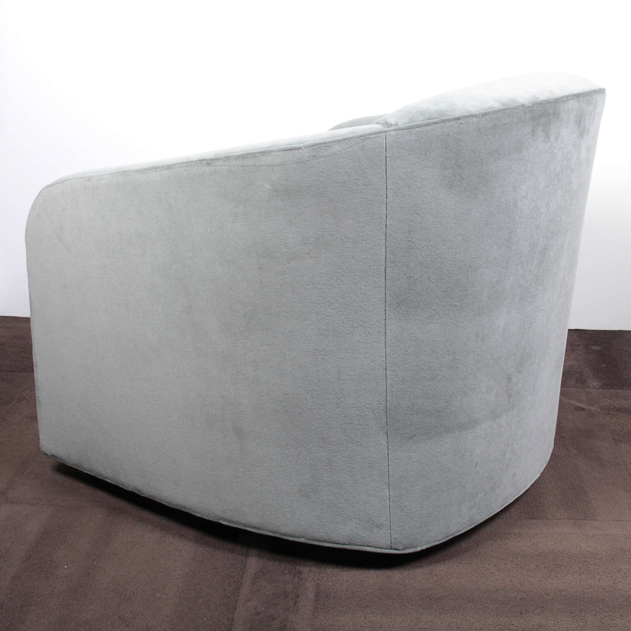 MidCentury Luxe Swivel Chair and Matching Ottoman by Milo Baughman at