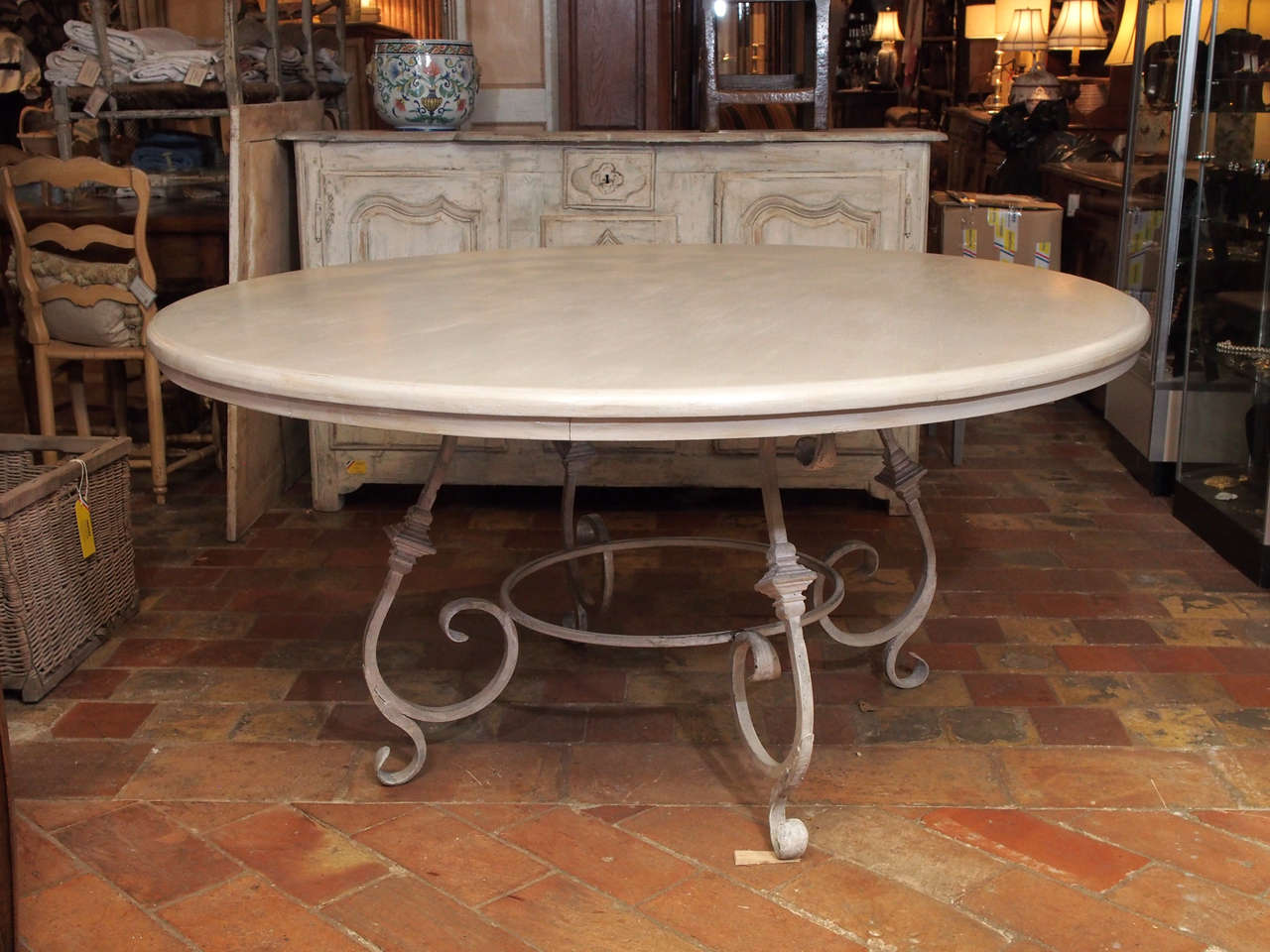 French Custom-Made Round Table With Antique Iron Base.