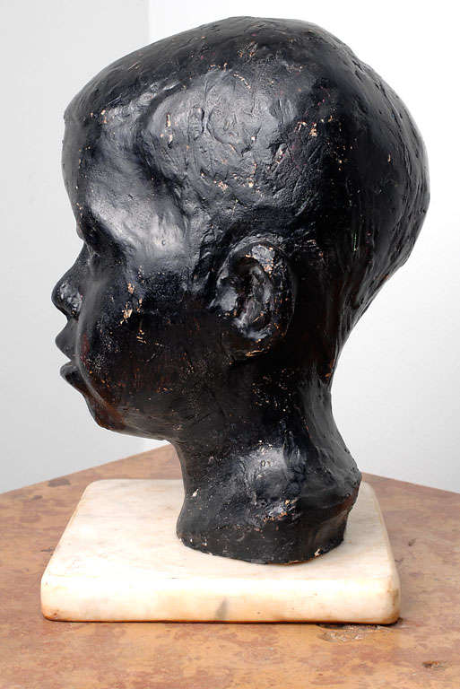 This is something that is beautiful and right, even though we don't know its complete hisotry. All that the family that sold this exceptional bust to us said is that it was created in the early 1930's by a woman artist (their 