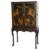 A 19th Century Chinoiserie Decorated Black Lacquer Cabinet