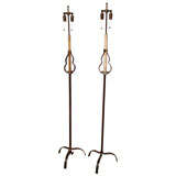 A Pair of French Provincal Wrought Iron Floor Lamps