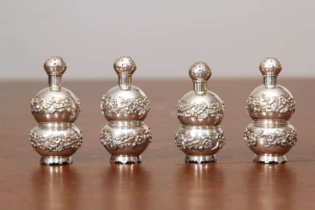 Set of four Japanese silver detachable salt and pepper cellars. No hallow mark but stamped in Japanese characters on bottoms