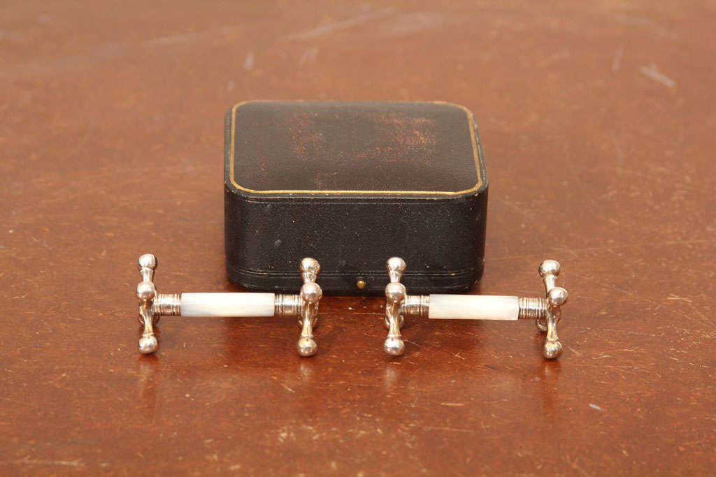English Sterling and mother-of-pearl hall marked knife rest in original box. Set of two.