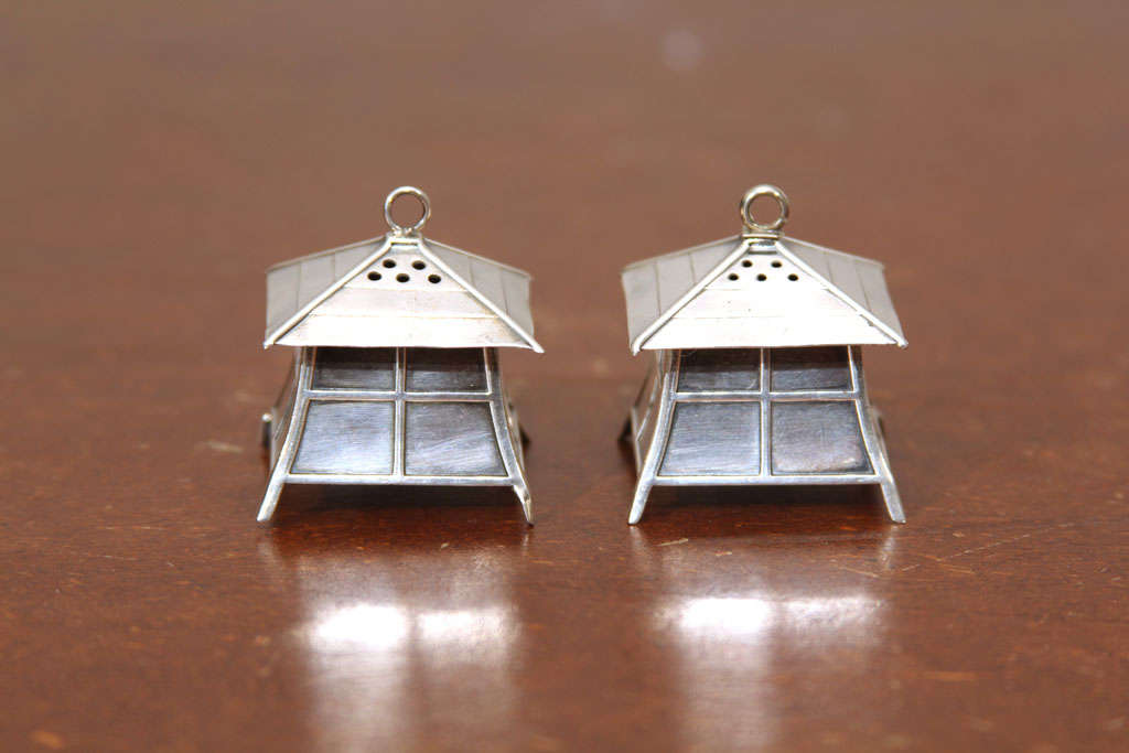 Sterling silver Pagoda salt and pepper shakers. Possible made in Japan. No hallmark is stamped.