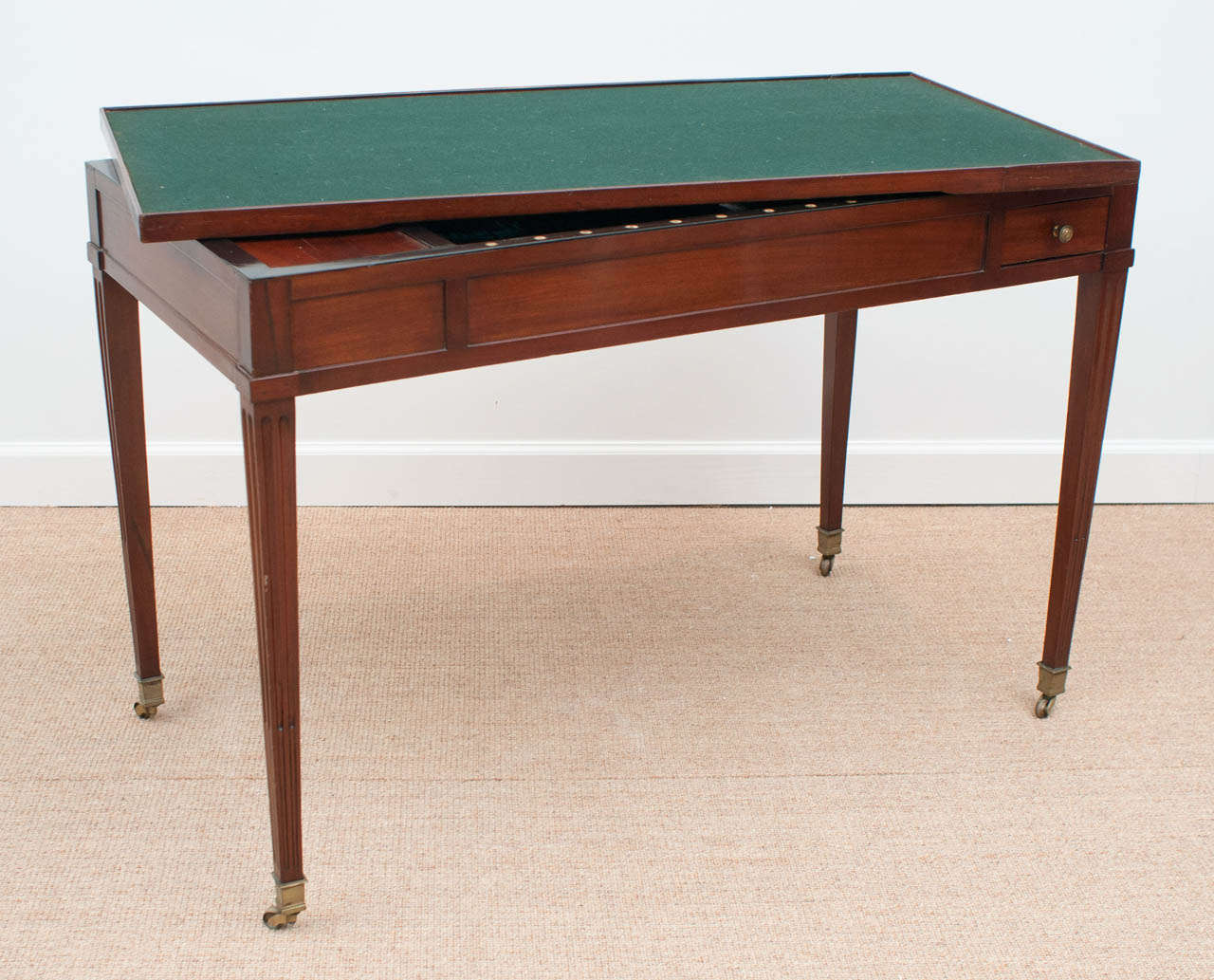 Early Nineteenth Century French Directoire Period mahogany games table, circa 1800.