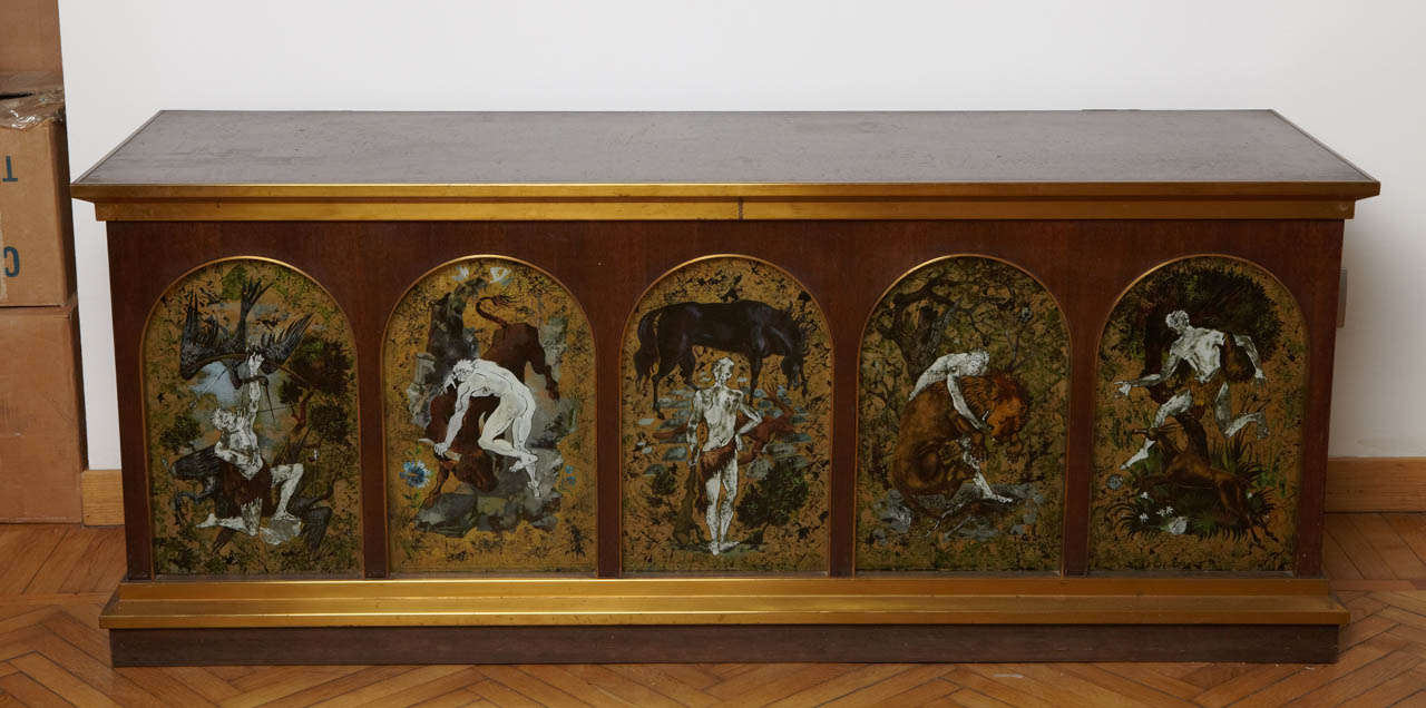 Walnut chest decorated with paintings on glass representing seven of the twelve labors of Hercules.
Italian manufacturer, 1950's.