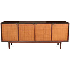 Walnut Credenza with caned doors And leather pulls, mfg. Knoll-1950's