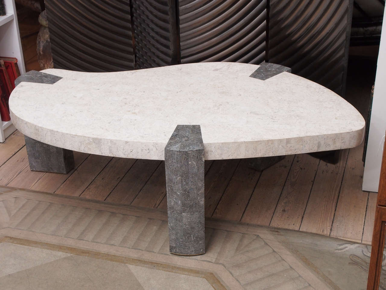 This exquisite Mid Century coffee table consists of off faux white marble with grey marbling.  Its top is an organic shape with more structured legs consisting of faux grey marble. Very lightweight with the look of actual marble. 