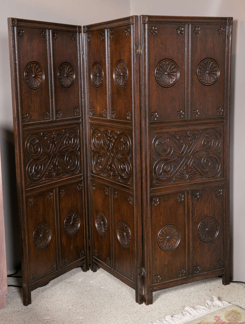 An English 19th century carved oak screen. Provenance- from Mary Rockefeller's Estate in Westchester NY.