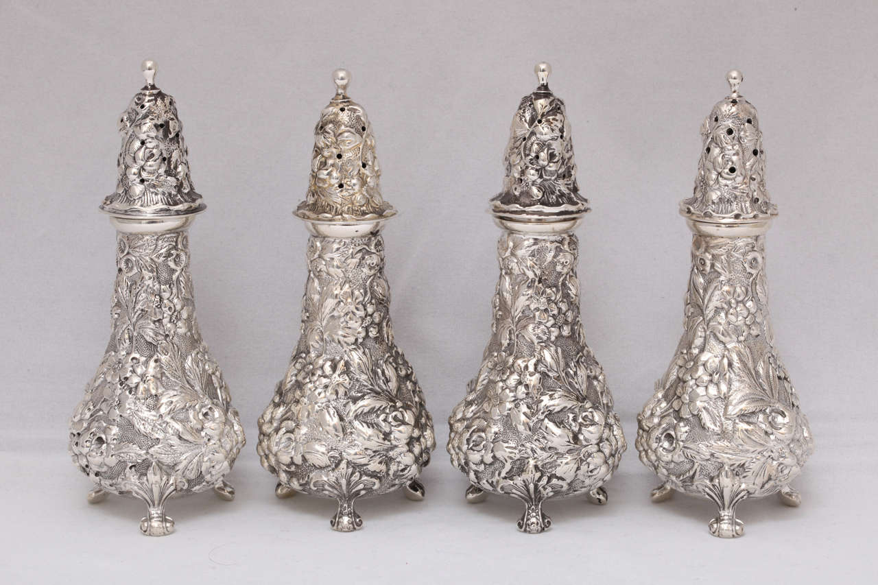 Suite of four, sterling silver, footed salt and pepper shakers, The Stieff Company, Baltimore, Maryland, year marked for 1931,