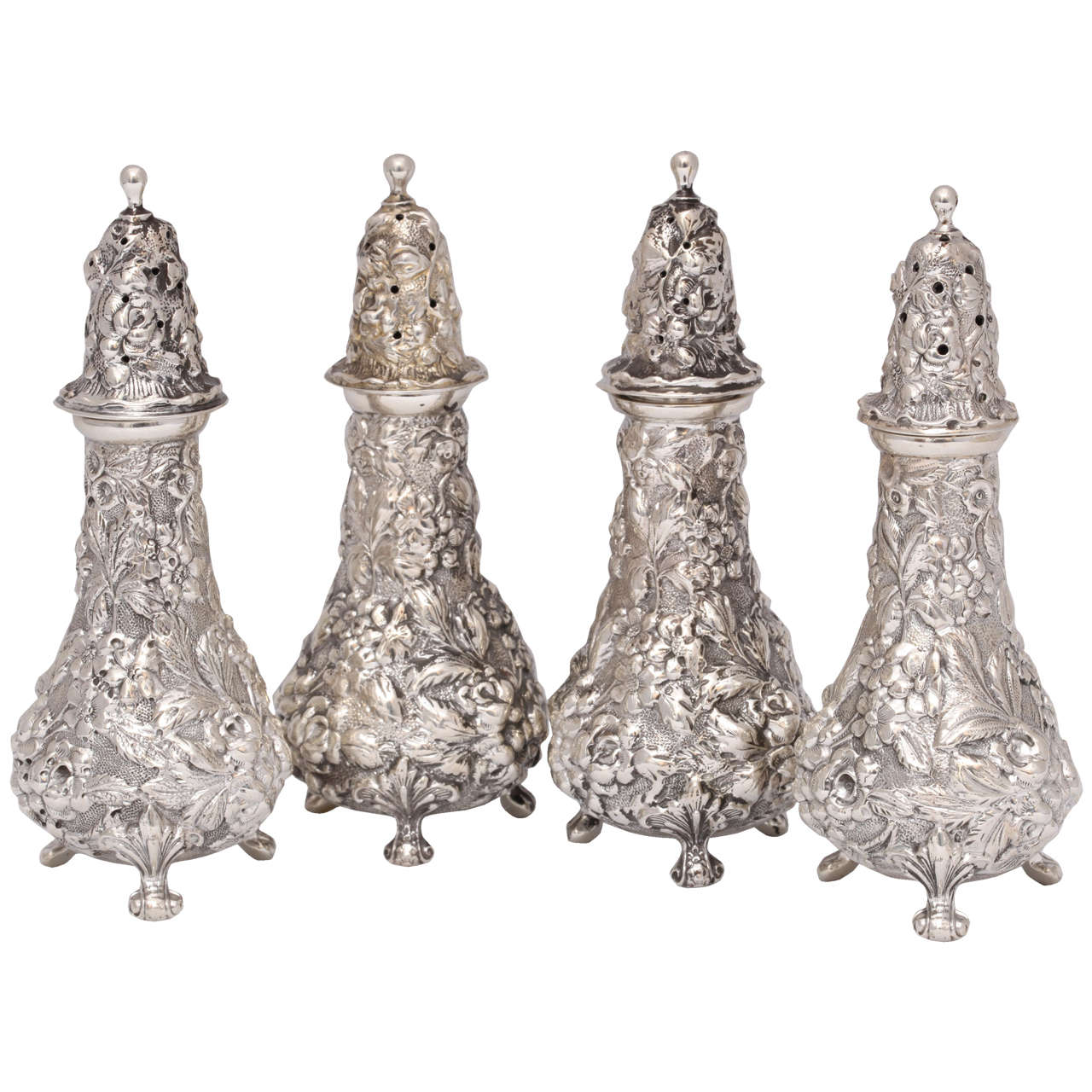 Suite of Four Sterling Silver Footed Salt and Pepper Shakers by Stieff