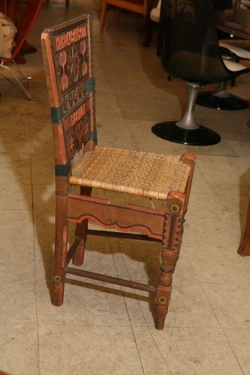 This charming painted chair came from Hordal's Hus, an Inn in Jutland in Denmark.  Horvald's Hus is situated in a forest reserve which was acquired 150 years ago by a group of Danish-Americans and was donated to the Danish State.  The conditions of