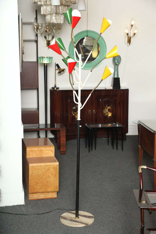 Elegant nine-arm Stilnovo floor lamp made in 1955-1959 in Milan.
Flexible brass arms on a black stem with marble base.
Unusual form. Great quality.
   