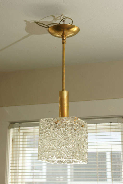 Square textured glass pendant ceiling fixture with brass accents by Kalmar.