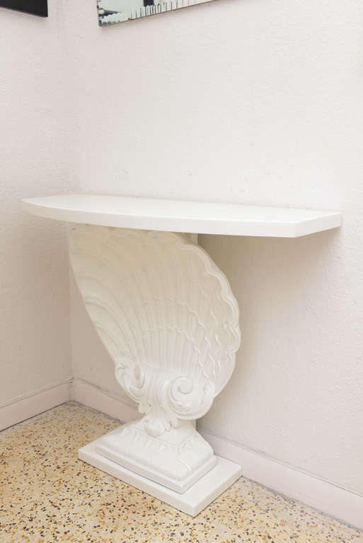 1950's Grosfeld House console table with a stylized shell center.
Newly lacquered.  Reduced from $3,000.00.

Please feel free to contact us directly for a shipping quote or additional information by clicking 