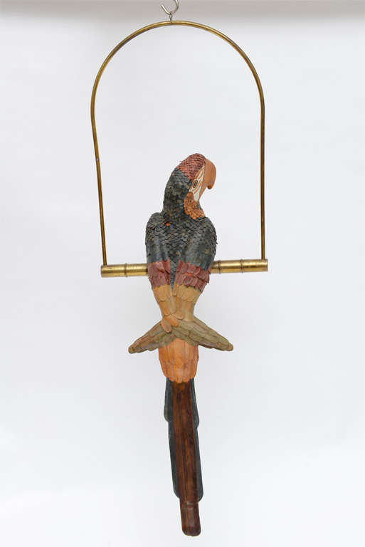 Leather parrot from Mexico. Sitting on a brass perch.
Marked Federico Made in Mexico.