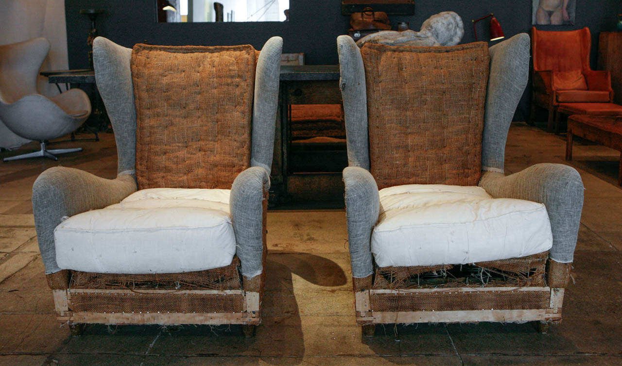 A pair of beautifully curved french wingback chairs.  Sold only as a pair.
