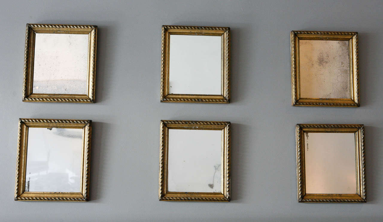 a beautiful collection of french hall mirrors with their water-gilt frames and original glass intact. * sold only as a set