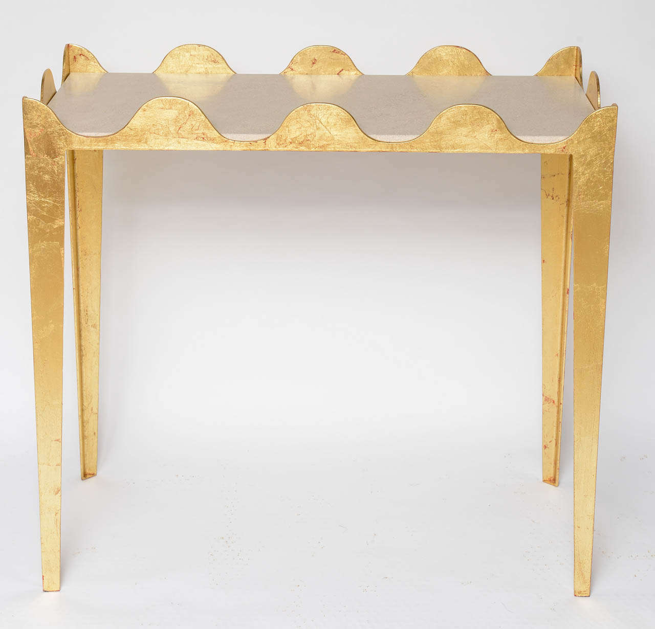 Pair of Console Tables in Gold Leaf Over Iron , w/ Portuguese Limestone tops. 
Can be used as consoles or serving tables.  Stunning!

This item is currently in our MIAMI facility. Please call or email us directly for details.