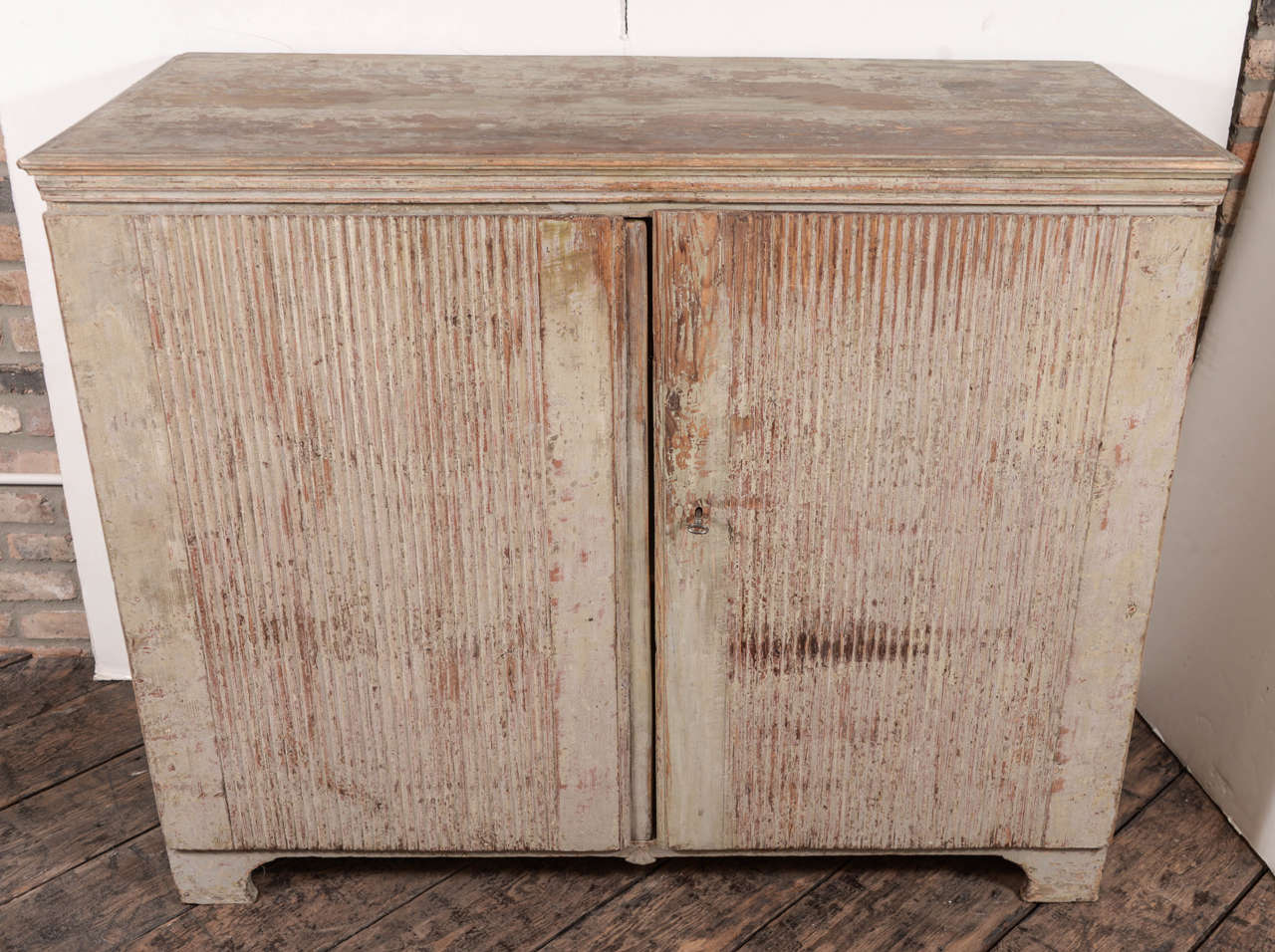 Simple but elegant Swedish Gustavian buffet, reeded doors and scraped to the original paint.