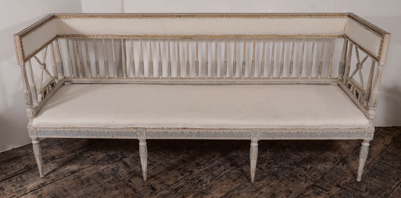 Swedish 18th century sofa. Made in Stockholm, ca 1790. Scraped to absolutely wonderful original grey and blue paint.  Gilding remains- an extremely elegant piece.