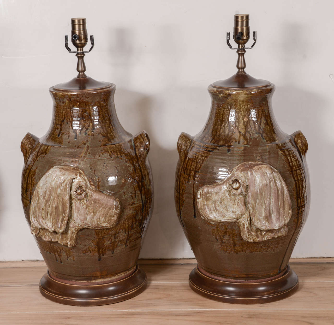 These are custom-made lamps using handmade pottery jugs from Georgia. Wood base. Shades not included.