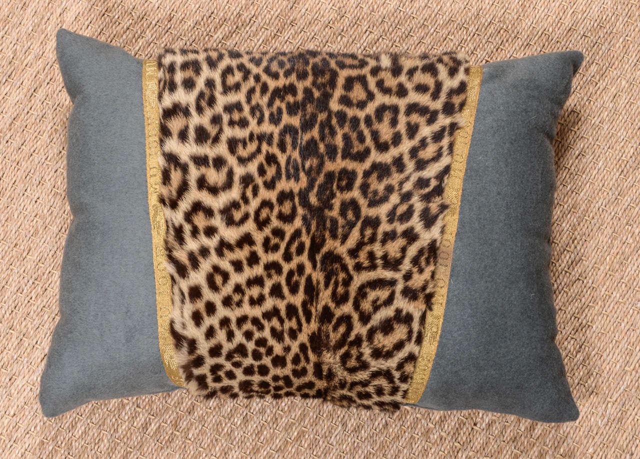 Vintage Leopard fragment pillow bordered by 19th Century French Galon. This unique and authentic fur fragment was found at a street fair south of Paris, France from a delightful little old man. A surprise jolt of pattern perfect in the midst of a