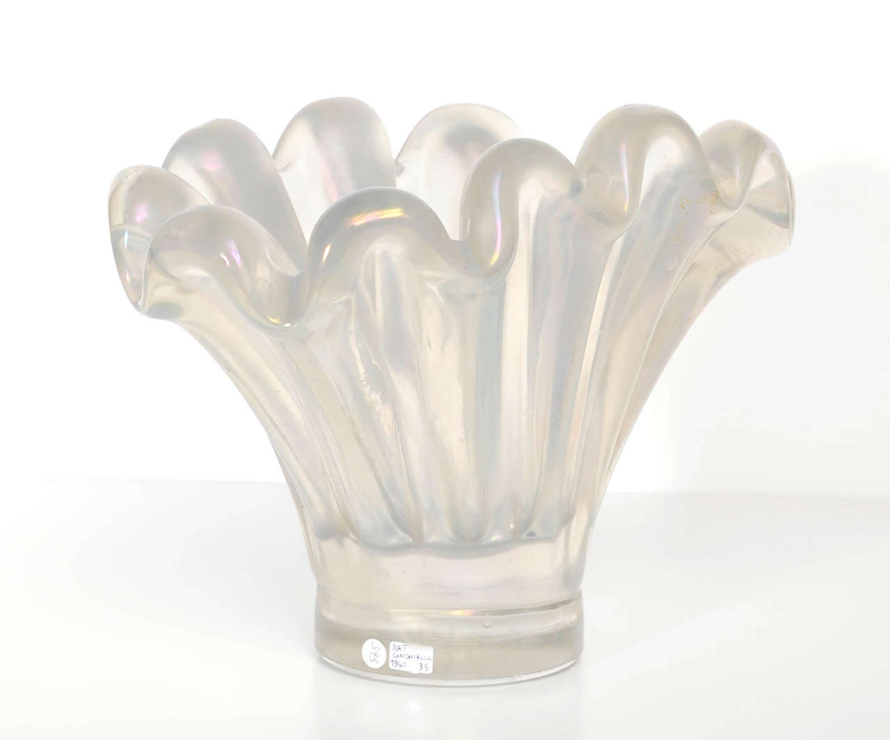 Shell-shaped vase in heavy iridescent glass.
Designed by Ercole Barovier.
Murano, 1942 circa.