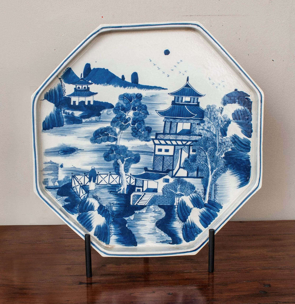 Octagonal tray or charger depicting traditional pagoda set in picturesque landscape.