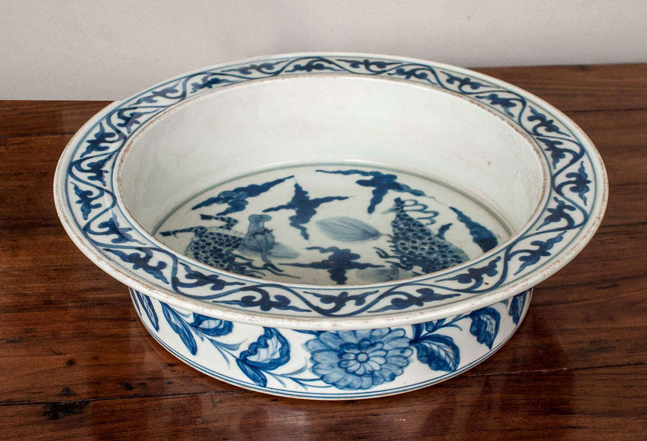 Chinese porcelain wash basin, with flat rim and mythical dragon motif.
