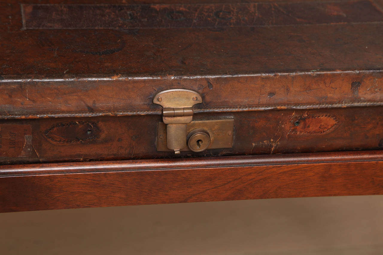 An Antique English Leather Gun Box on Mahogany Stand 1
