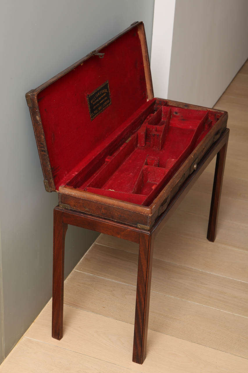 An Antique English Leather Gun Box on Mahogany Stand 3